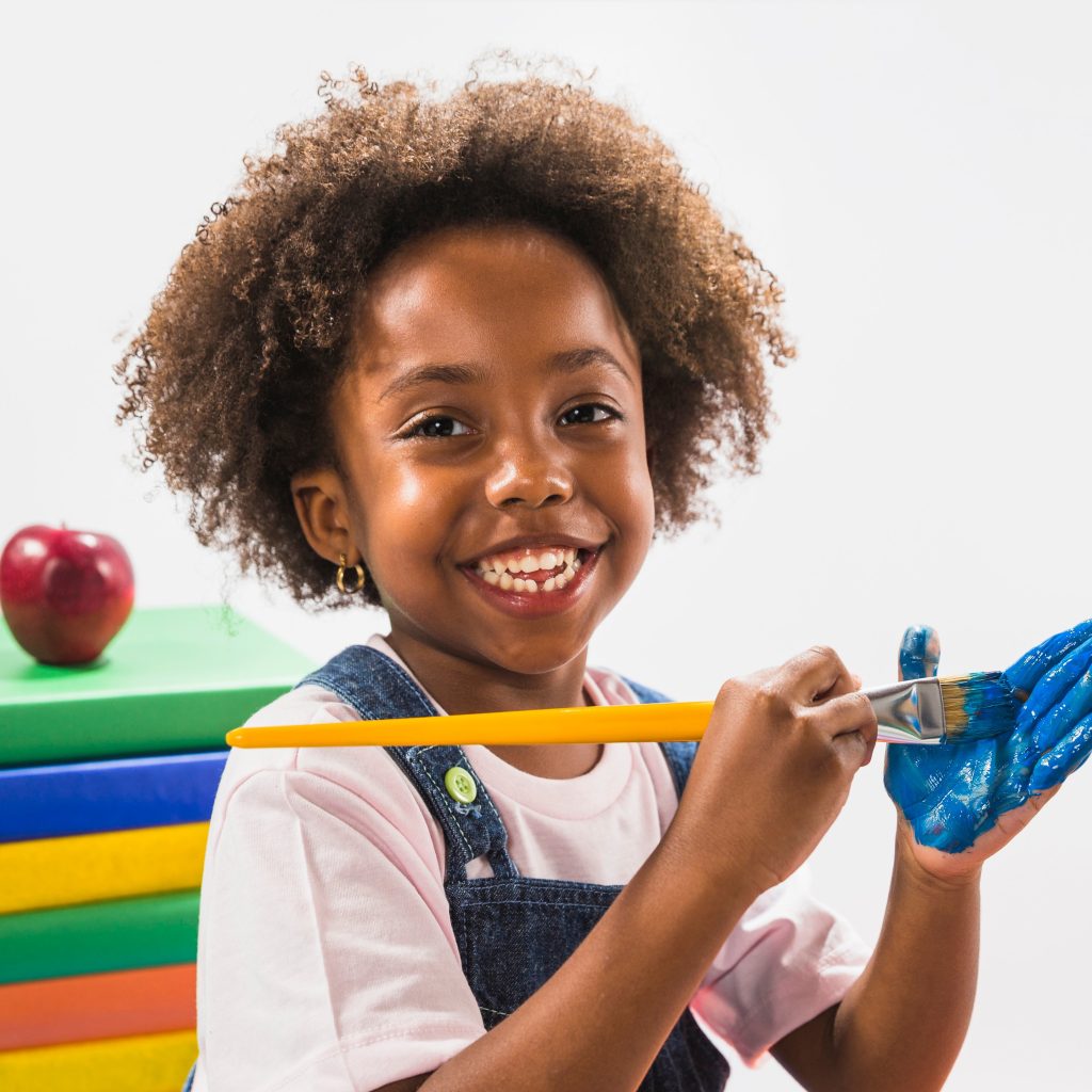girl-coloring-hand-with-blue-studio